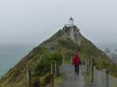 Randall in rain Nugget Point Lighthouse Dec 2015